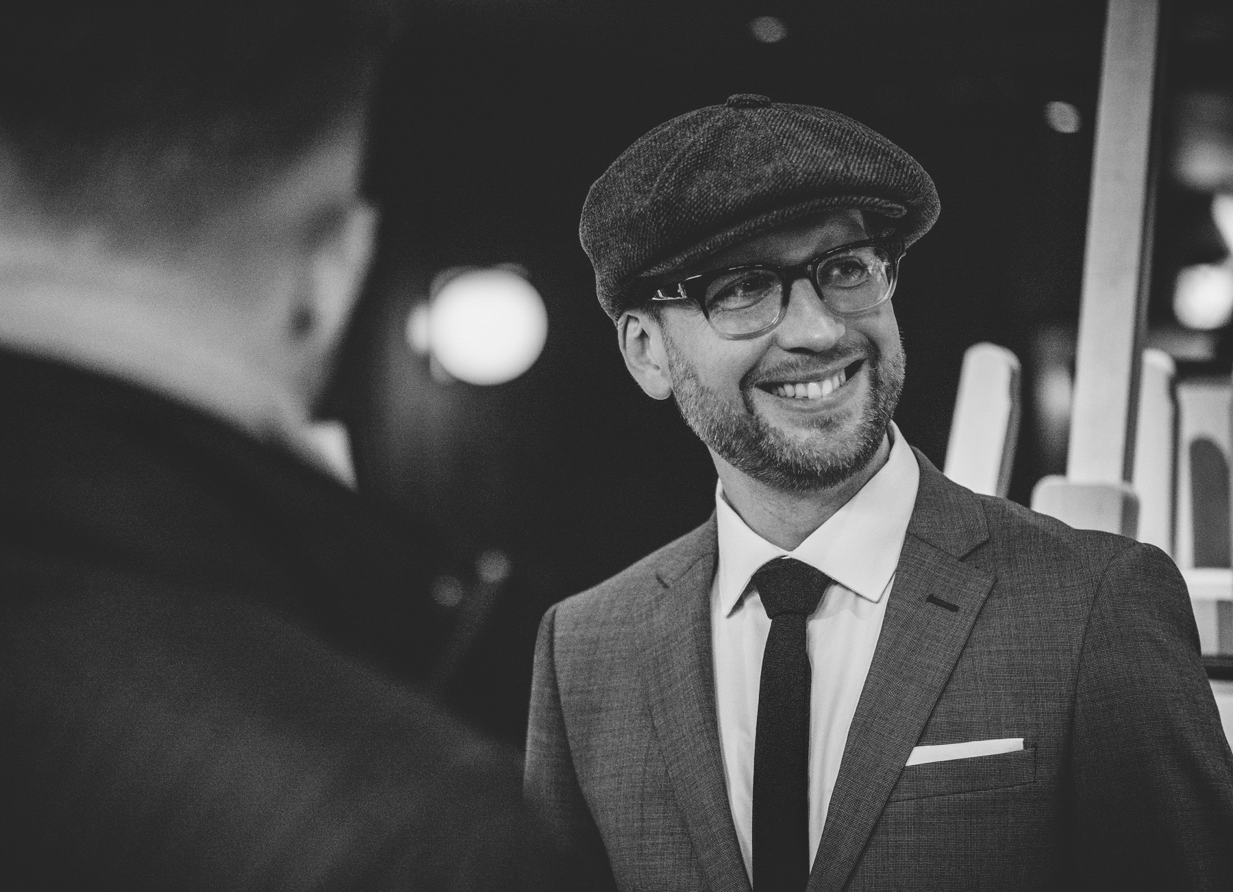 Jay McLaughlin Grey Suit Newsboy Cap Pocket Square Black Tie Glasses Style&nbsp;